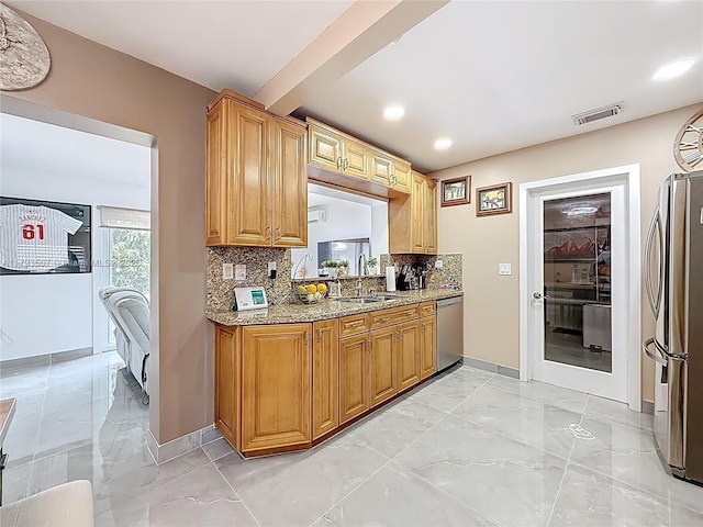 kitchen featuring visible vents, marble finish floor, tasteful backsplash, a sink, and appliances with stainless steel finishes