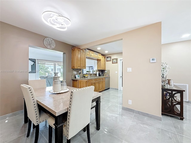 dining area featuring baseboards, recessed lighting, and visible vents