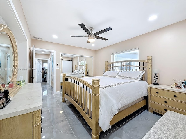 bedroom with recessed lighting, ceiling fan, visible vents, and marble finish floor
