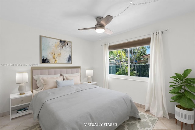 1531 NE 32nd St, Pompano Beach, FL 33064 - bedroom with a ceiling fan and light tile patterned floors