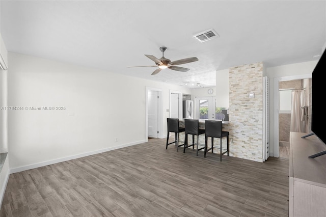 1531 NE 32nd St, Pompano Beach, FL 33064 - living room with visible vents, ceiling fan, wood finished floors, and track lighting