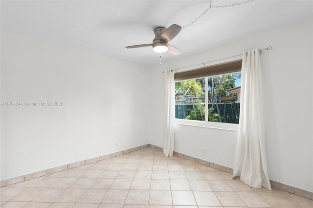 1531 NE 32nd St, Pompano Beach, FL 33064 - spare room featuring baseboards and ceiling fan