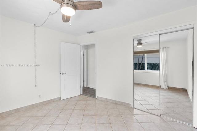 1531 NE 32nd St, Pompano Beach, FL 33064 - unfurnished bedroom featuring ceiling fan, visible vents, baseboards, and a closet