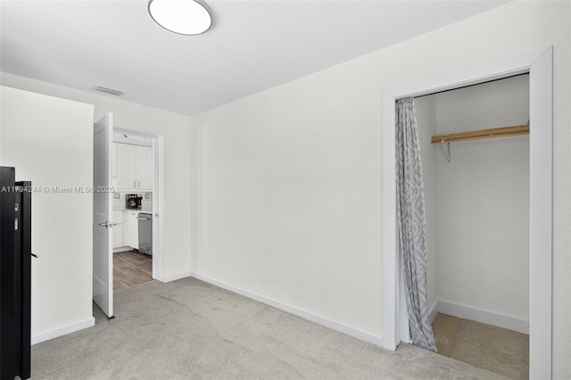 1531 NE 32nd St, Pompano Beach, FL 33064 - unfurnished bedroom with carpet floors, baseboards, a closet, and visible vents