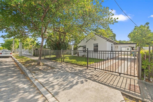 exterior space with a fenced front yard