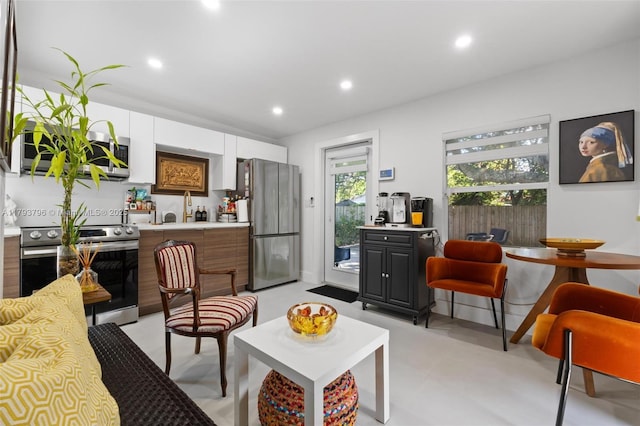 living room with recessed lighting