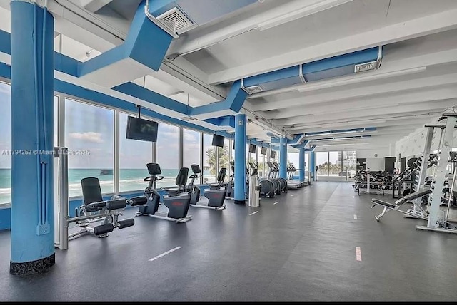 5401 Collins Ave Unit 411, Miami Beach, FL 33140 - workout area with visible vents and expansive windows