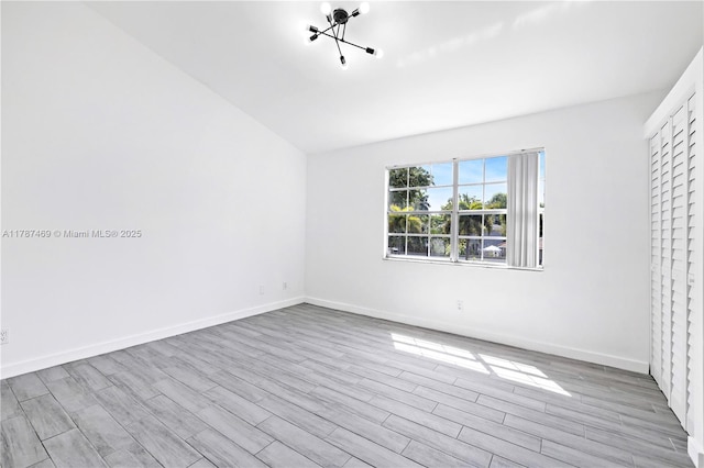2917 NW Belmont Ln Unit 2917, Cooper City, FL 33026 - spare room featuring baseboards and wood finished floors
