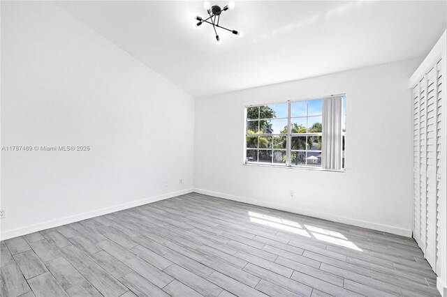 2917 NW Belmont Ln Unit 2917, Cooper City, FL 33026 - spare room featuring baseboards and wood finished floors