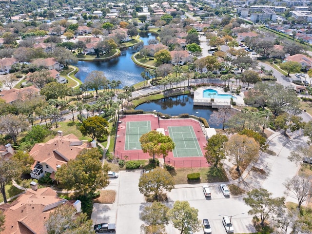 birds eye view of property featuring a residential view and a water view