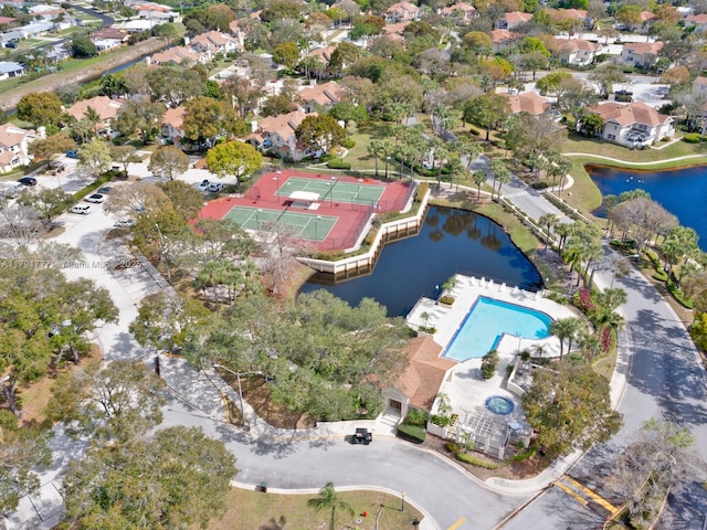 aerial view with a water view and a residential view
