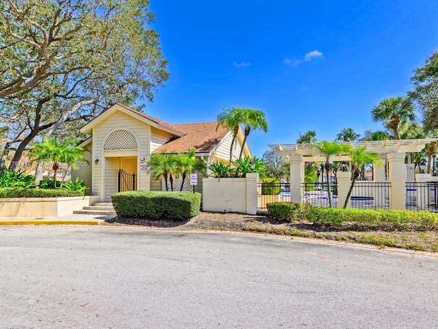 view of front of home with fence