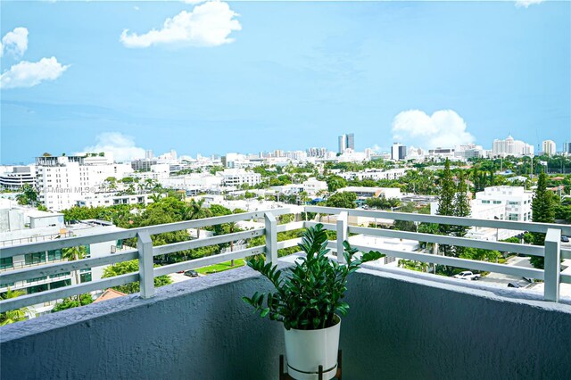 balcony featuring a view of city