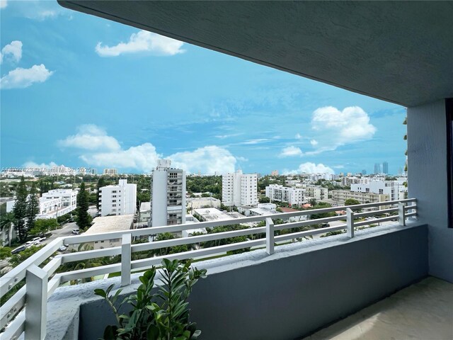 balcony featuring a view of city