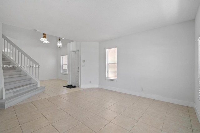 6813 Torch Key St, Lake Worth, FL 33467 - interior space with stairs, baseboards, and tile patterned flooring