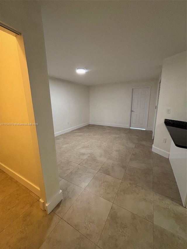 interior space with baseboards