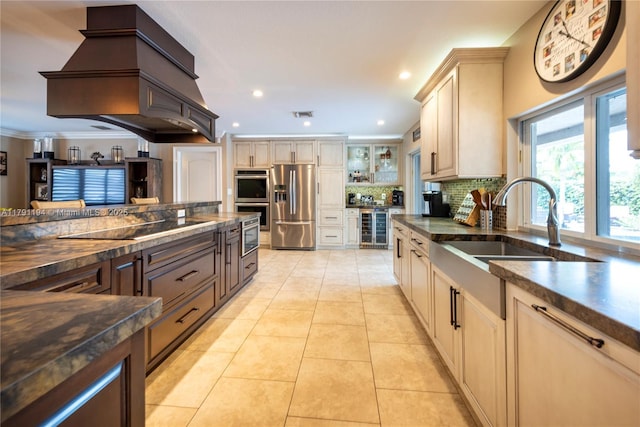 kitchen featuring stainless steel appliances, wine cooler, custom exhaust hood, decorative backsplash, and light tile patterned floors