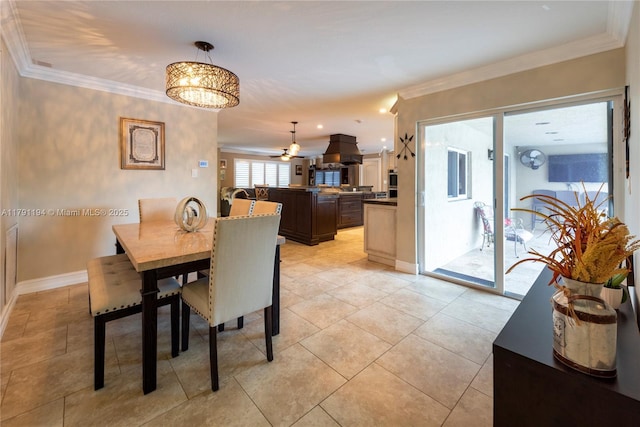 dining space featuring ceiling fan, light tile patterned floors, baseboards, and ornamental molding