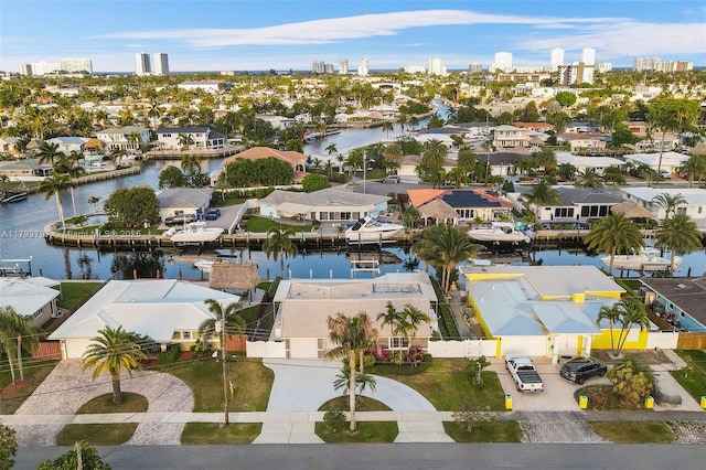 aerial view featuring a residential view and a water view