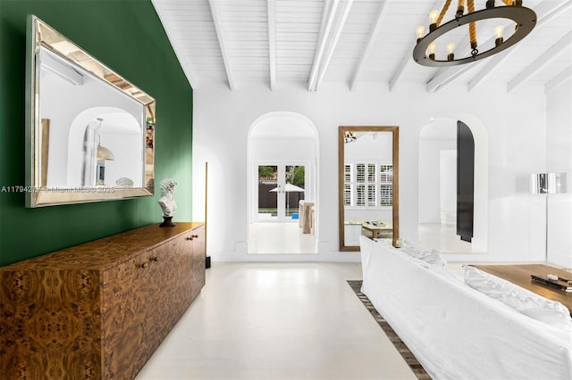712 NE 72nd St, Miami, FL 33138 - interior space with an inviting chandelier, wooden ceiling, and beamed ceiling