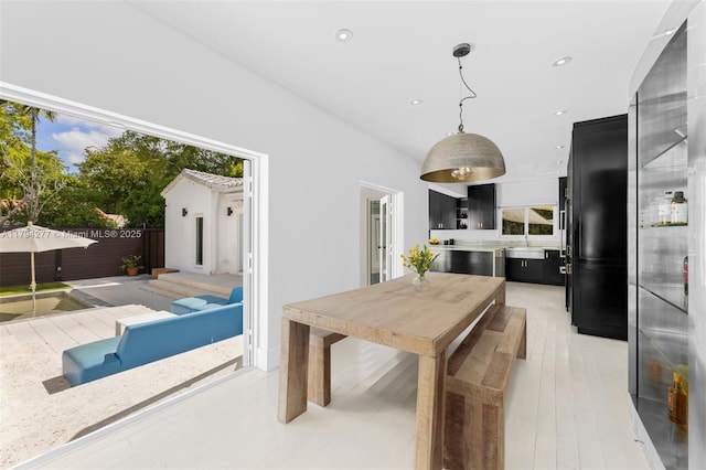 712 NE 72nd St, Miami, FL 33138 - living room with recessed lighting, finished concrete flooring, and baseboards