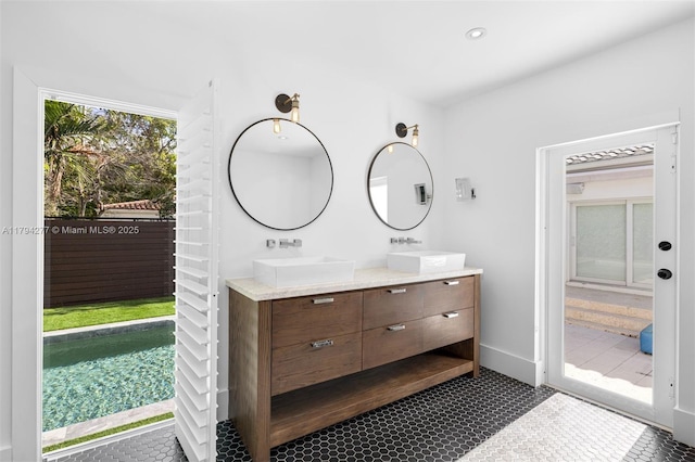 712 NE 72nd St, Miami, FL 33138 - bedroom with baseboards and recessed lighting