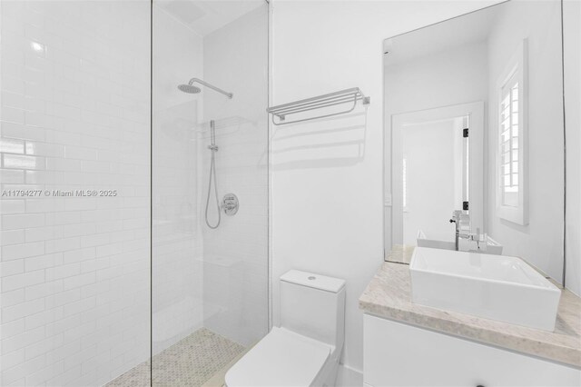 712 NE 72nd St, Miami, FL 33138 - full bathroom featuring vanity, walk in shower, and toilet