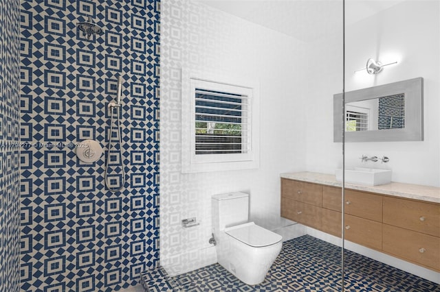 712 NE 72nd St, Miami, FL 33138 - bathroom with vanity, tile patterned floors, a tile shower, and toilet