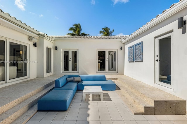 712 NE 72nd St, Miami, FL 33138 - view of patio / terrace featuring french doors and outdoor lounge area