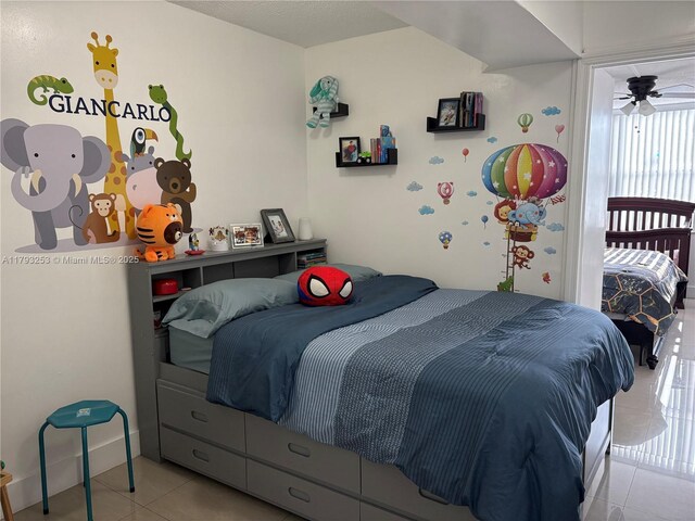 1680 NE 191st St Unit 118-2, Miami, FL 33179 - bedroom with tile patterned floors