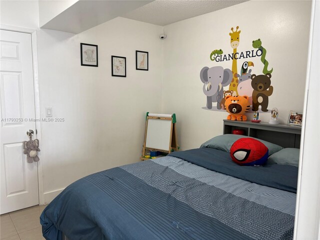 1680 NE 191st St Unit 118-2, Miami, FL 33179 - view of tiled bedroom