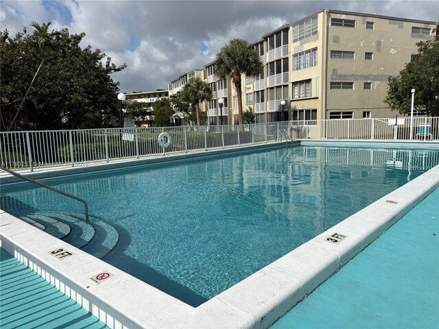 1680 NE 191st St Unit 118-2, Miami, FL 33179 - pool with fence