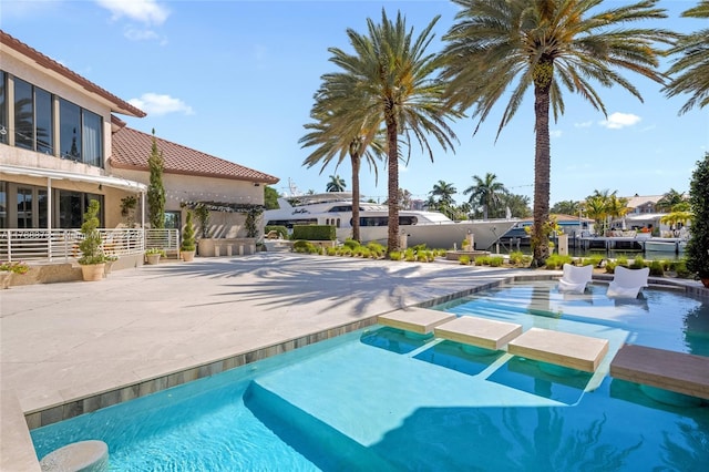 600 Isle Of Palms Dr, Fort Lauderdale, FL 33301 - view of pool featuring fence, a patio, and a pool with connected hot tub