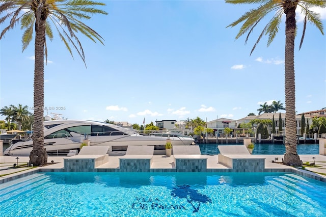 600 Isle Of Palms Dr, Fort Lauderdale, FL 33301 - outdoor pool featuring a boat dock and a water view