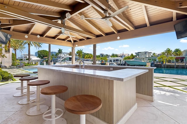 600 Isle Of Palms Dr, Fort Lauderdale, FL 33301 - view of patio / terrace featuring a ceiling fan and outdoor dry bar