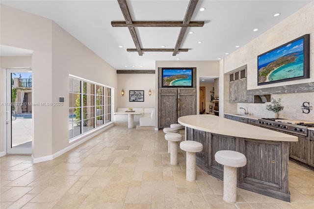 600 Isle Of Palms Dr, Fort Lauderdale, FL 33301 - bar with stone tile floors, recessed lighting, baseboards, stainless steel gas stovetop, and coffered ceiling
