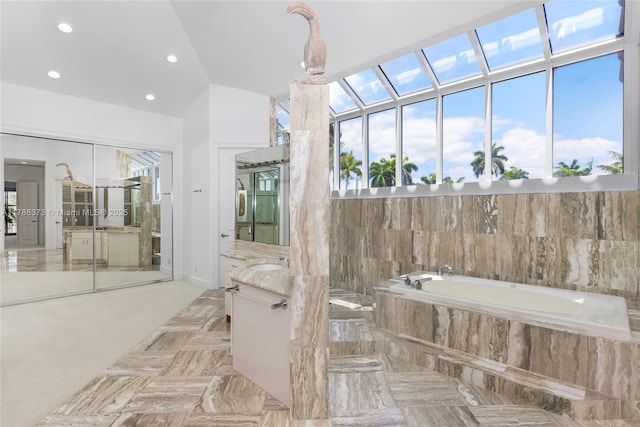 600 Isle Of Palms Dr, Fort Lauderdale, FL 33301 - full bathroom featuring vanity, recessed lighting, and a garden tub