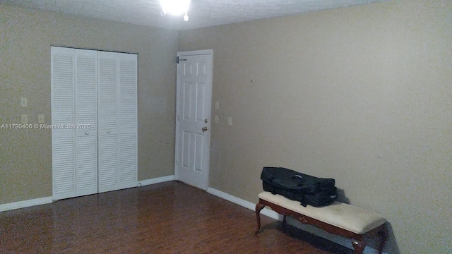10737 SE Seaspray Ct, Hobe Sound, FL 33455 - sitting room with baseboards and wood finished floors