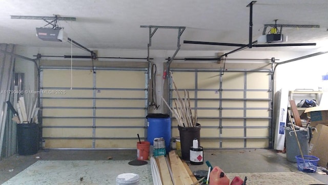 10737 SE Seaspray Ct, Hobe Sound, FL 33455 - garage with a garage door opener