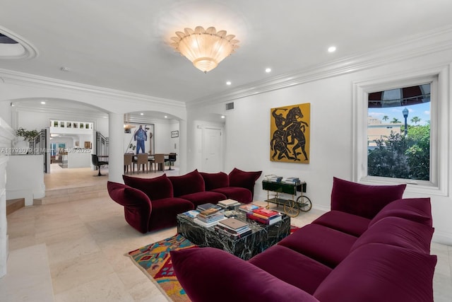 living room with arched walkways, recessed lighting, decorative columns, visible vents, and ornamental molding