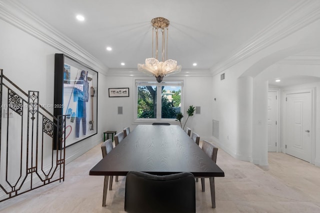 dining area with an inviting chandelier, arched walkways, visible vents, and recessed lighting