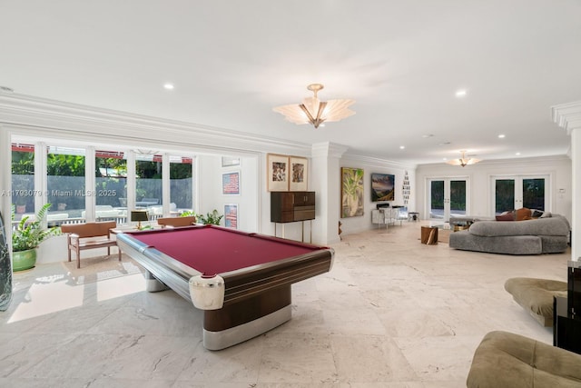 playroom with recessed lighting, a notable chandelier, ornamental molding, and french doors