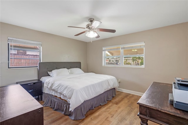 6501 Scott St, Hollywood, FL 33024 - bedroom with baseboards, a ceiling fan, and light wood-style flooring