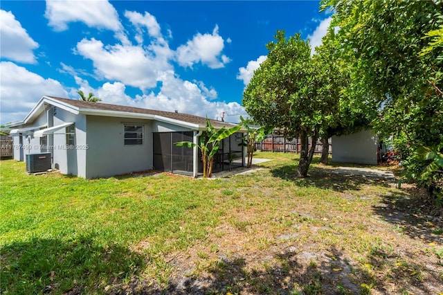 6501 Scott St, Hollywood, FL 33024 - view of yard featuring fence, a sunroom, and cooling unit