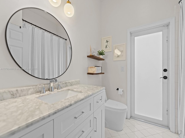 973 NE 36th Ave, Homestead, FL 33033 - full bathroom featuring tile patterned floors, vanity, and toilet