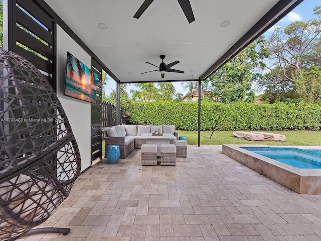 973 NE 36th Ave, Homestead, FL 33033 - view of patio with a hot tub, ceiling fan, an outdoor living space, and a fenced backyard