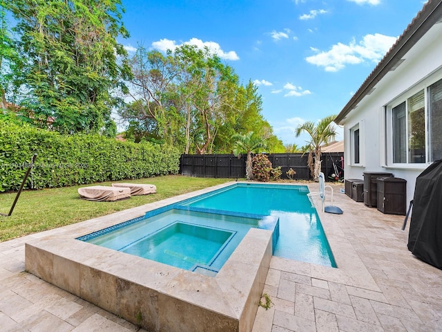 973 NE 36th Ave, Homestead, FL 33033 - view of pool with a fenced backyard, a fenced in pool, an in ground hot tub, a patio area, and a yard
