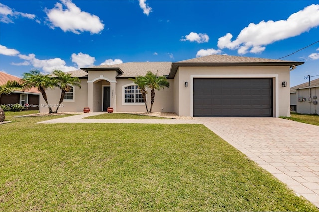 2041 SW Imperial St, Port St Lucie, FL 34987 - single story home with concrete driveway, an attached garage, stucco siding, and a front yard