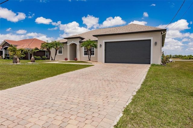 view of front of property with decorative driveway, a front lawn, and stucco siding