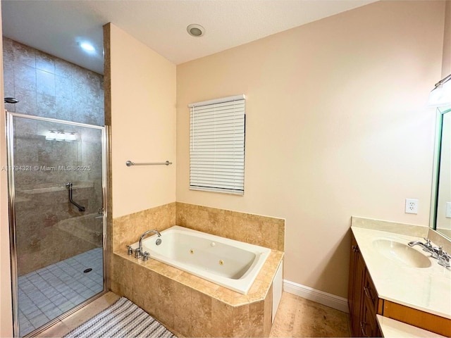 full bathroom featuring vanity, a whirlpool tub, a stall shower, and tile patterned floors